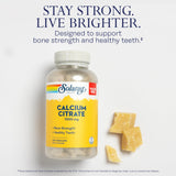 SOLARAY Calcium Citrate 1000mg capsules on a wooden surface