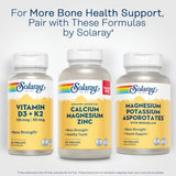 SOLARAY Calcium Magnesium Zinc Supplement on a wooden table