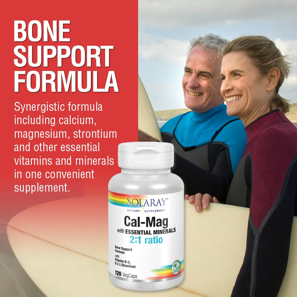 SOLARAY Comprehensive Bone Support Supplement capsules on a wooden surface