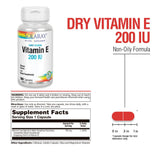 SOLARAY Dry Vitamin E 200 IU capsules on a wooden surface