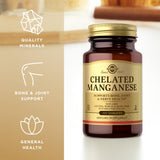 Solgar Chelated Manganese 281g capsules on a wooden surface