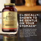 Solgar Ester-C Plus 500 mg Vitamin C Capsules with a glass of water