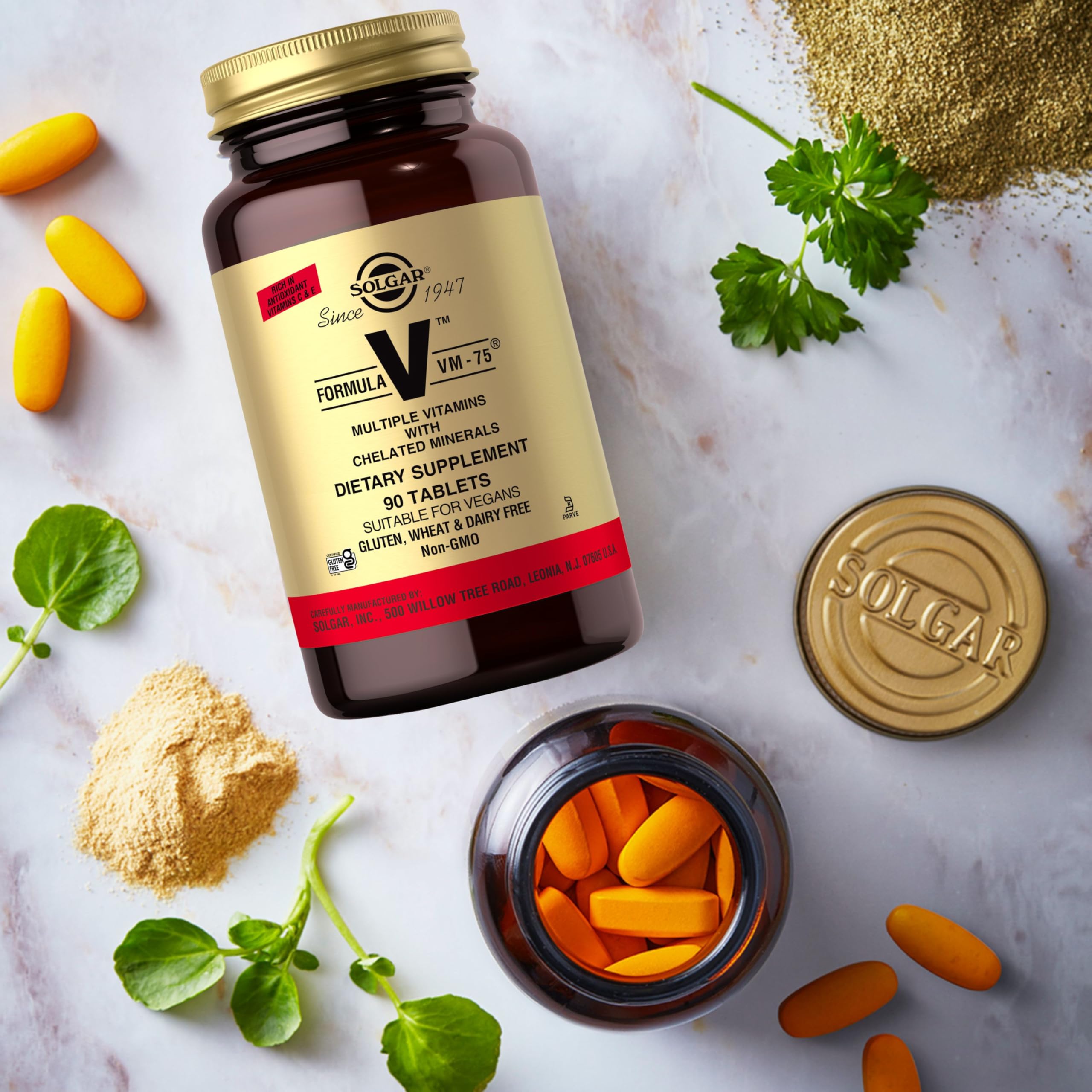 Solgar Formula VM-75 Multivitamin and Mineral Supplement with a glass of water