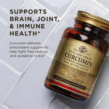 Solgar Full Spectrum Curcumin 40mg LiCaps on a wooden table