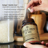 Solgar Gentle Iron 25mg capsules on a wooden table