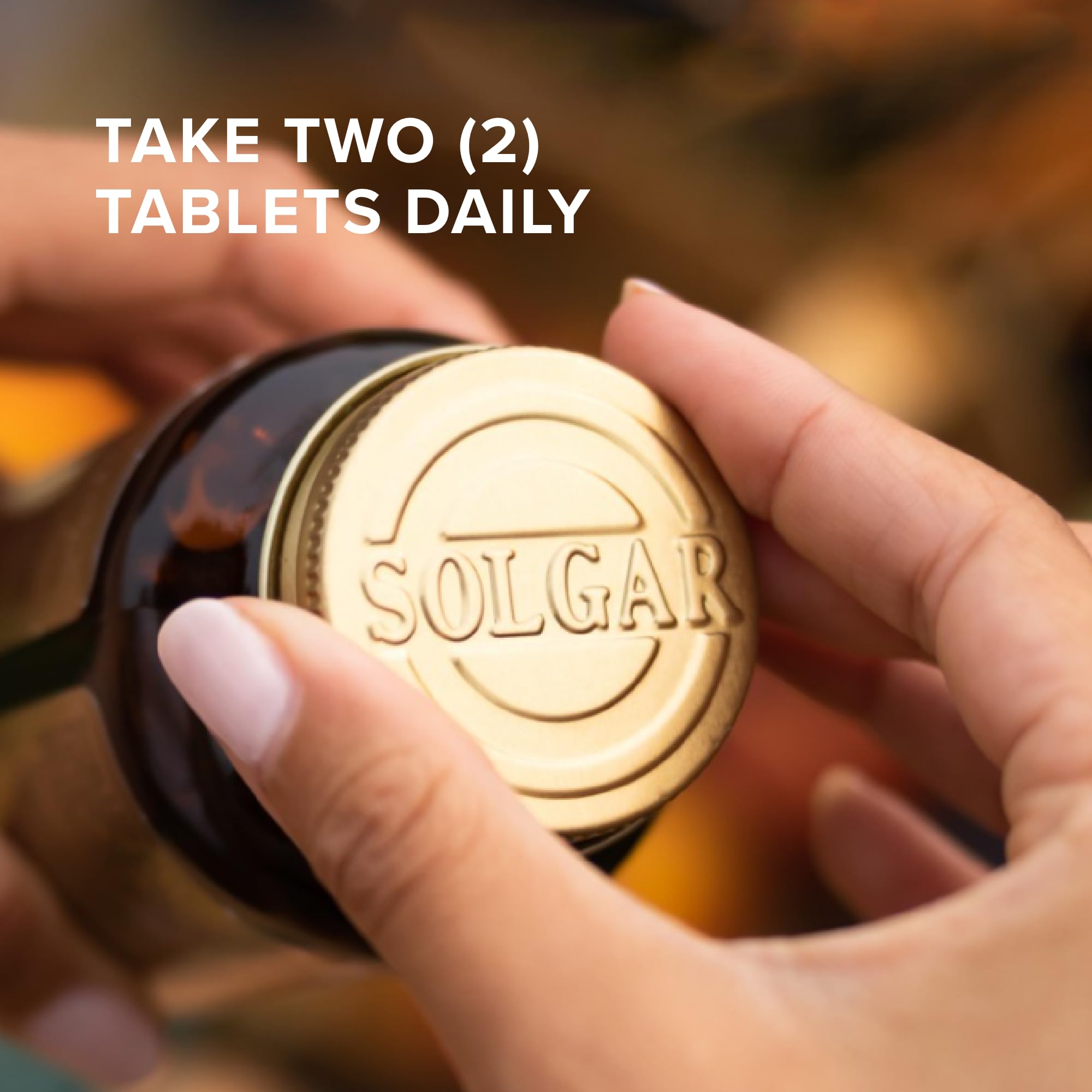 Solgar Skin, Nails & Hair + Biotin 142g capsules on a wooden table