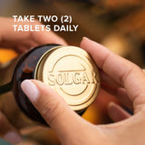 Solgar Skin, Nails & Hair + Biotin 142g capsules on a wooden table