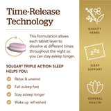 Solgar Triple Action Sleep tablets on a wooden table