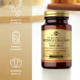 Solgar Vitamin B12 100g supplement capsules on a table