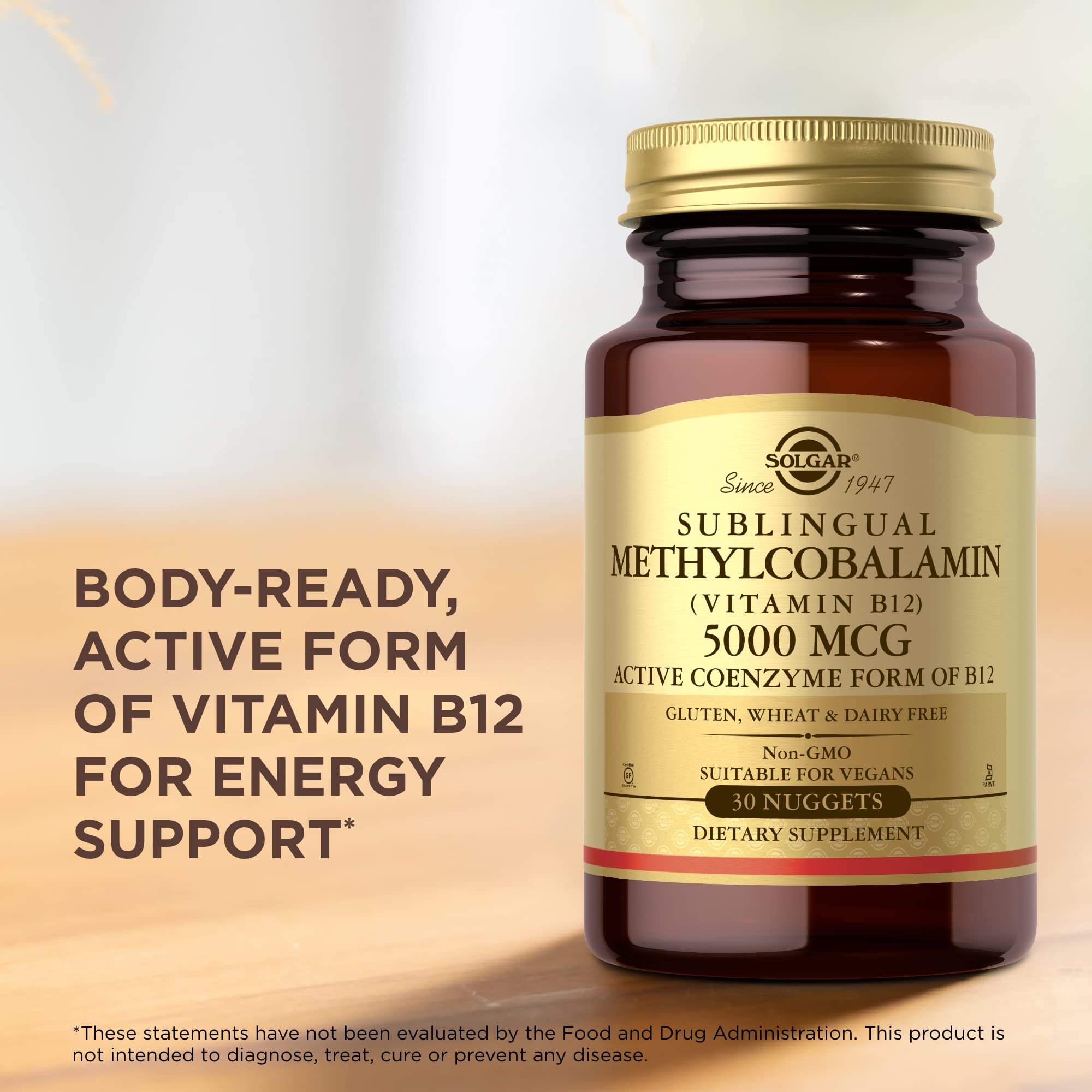 Solgar Vitamin B12 100g supplement with a measuring spoon