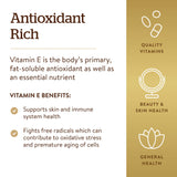 Solgar Vitamin E softgels displayed with a measuring spoon