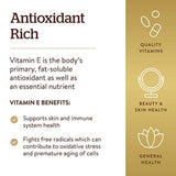 Solgar Vitamin E softgels on a wooden table