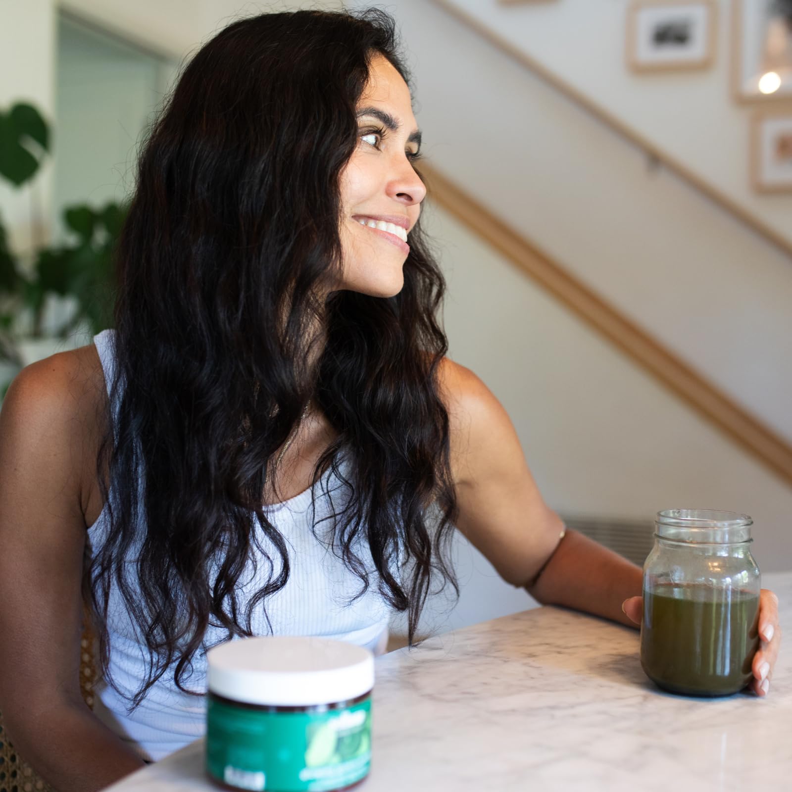 Solluna Spirulina Superfood Greens Powder mixed in a smoothie