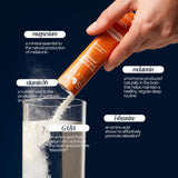 Som Sleep Restorative Sleep Drink Mix powder in a glass