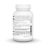 Source Naturals B-Complex tablets on a wooden surface