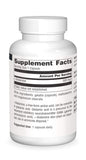 Source Naturals L-Glutamine capsules on a wooden surface