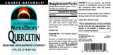 Source Naturals Quercetin NutraDrops 113g packaging on a wooden table