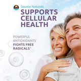 Source Naturals Resveratrol Supplement with a glass of water