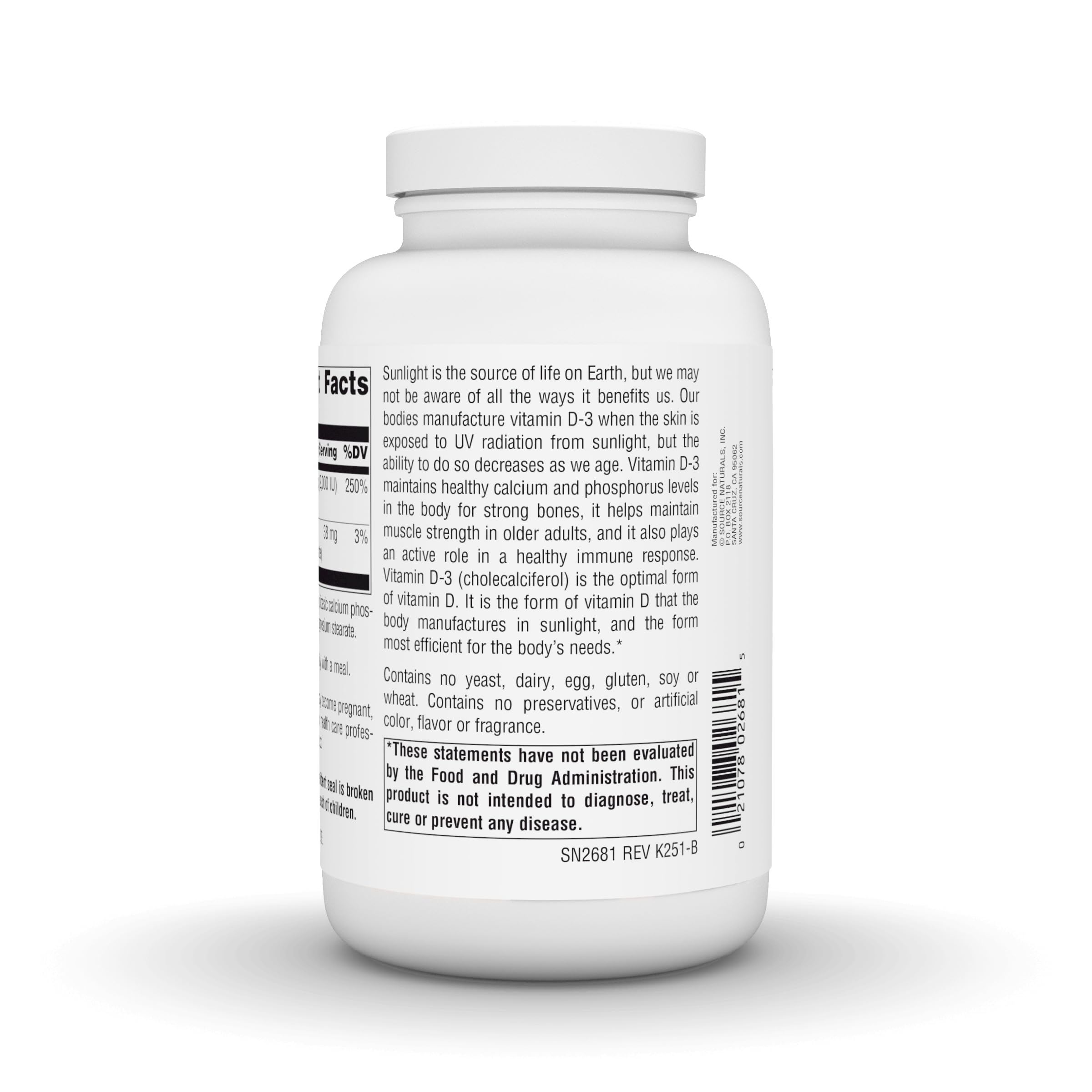Source Naturals Vitamin D-3 capsules on a wooden table