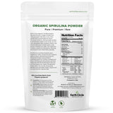 Spoonful of Earth Circle Organics Spirulina Powder on a wooden table