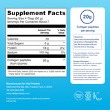 Spoonful of Vital Proteins Collagen Peptides powder on a wooden table