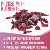 Spoonful of XPRS Nutra Dulse Powder on a wooden table