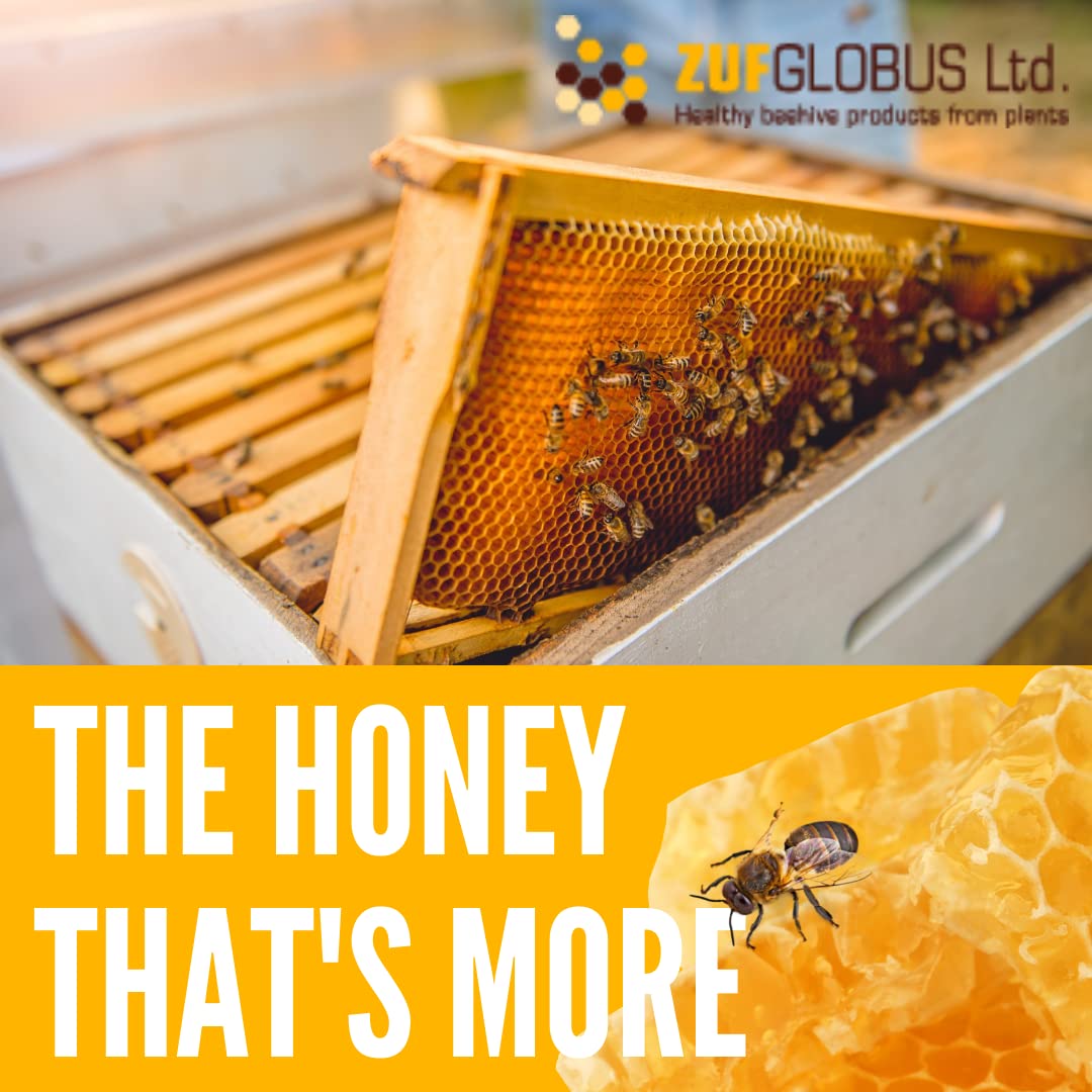 Spoonful of Zuf Globus LaryngoMEL herbal honey on a wooden spoon