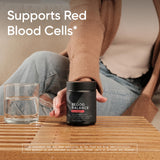 Sports Research Blood Balance Iron Support Supplement on a wooden table