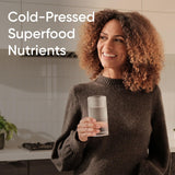 Sports Research Blueberry Fruit Complex softgel capsules on a wooden table