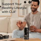 Sports Research CLA Softgels with a measuring spoon