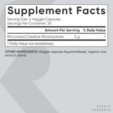 Sports Research Creatine Monohydrate Powder 5g Capsules on a gym bench