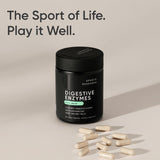 Sports Research daily Enzymes capsules on a wooden table