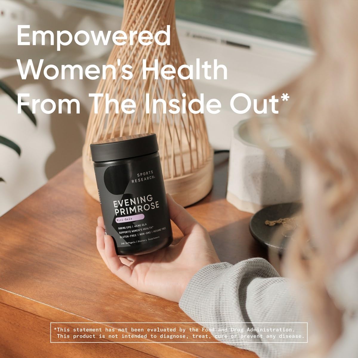 Sports Research Evening Primrose Oil 1300mg mini softgels on wooden surface