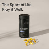 Sports Research Flaxseed Oil bottle with a measuring spoon
