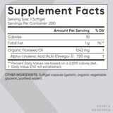 Sports Research Flaxseed Oil Softgels displayed on a wooden table