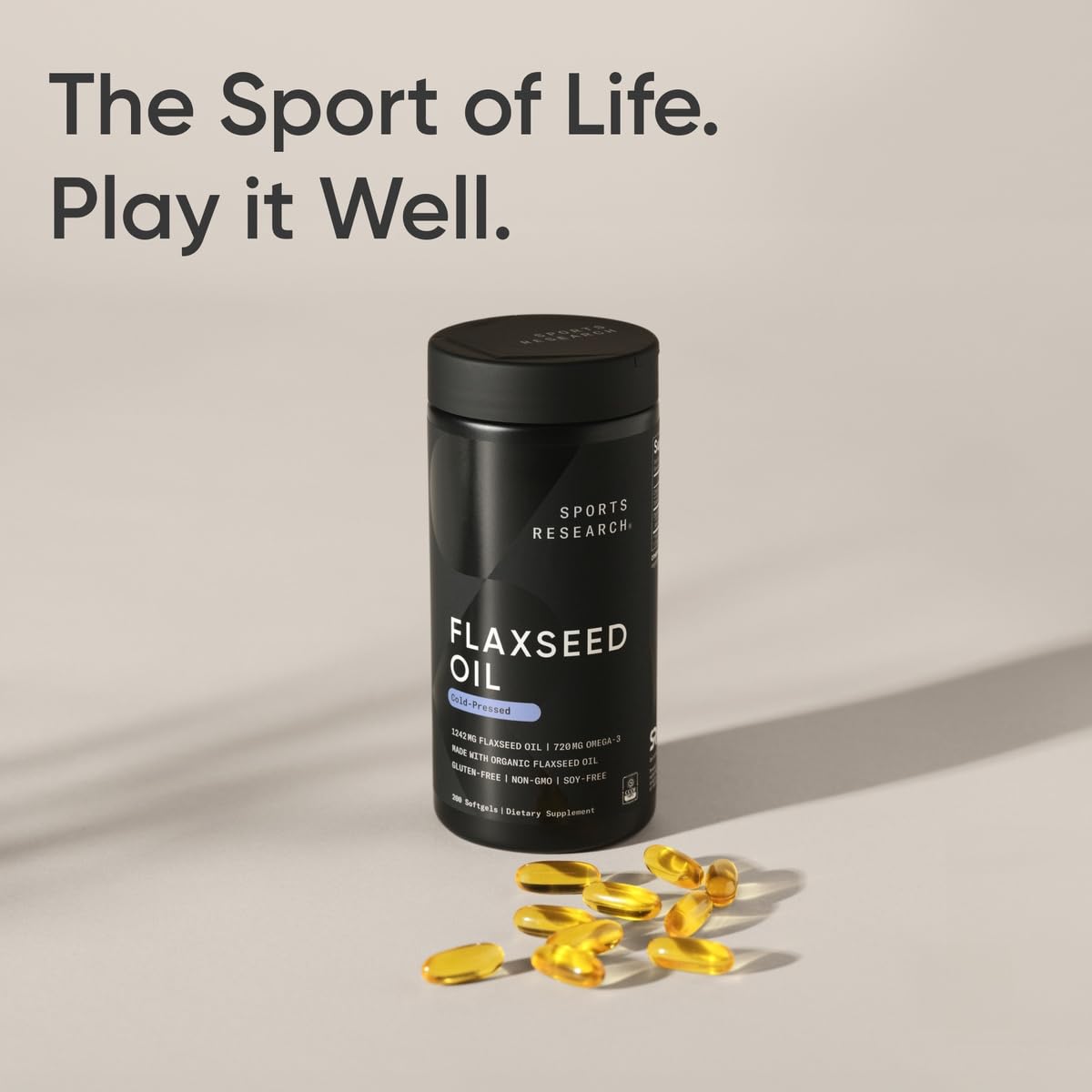 Sports Research Flaxseed Oil Softgels in hand for scale
