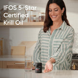 Sports Research Krill Oil 500mg Softgels with a glass of water