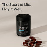 Sports Research Magnesium Glycinate 160mg vegan capsules with a glass of water