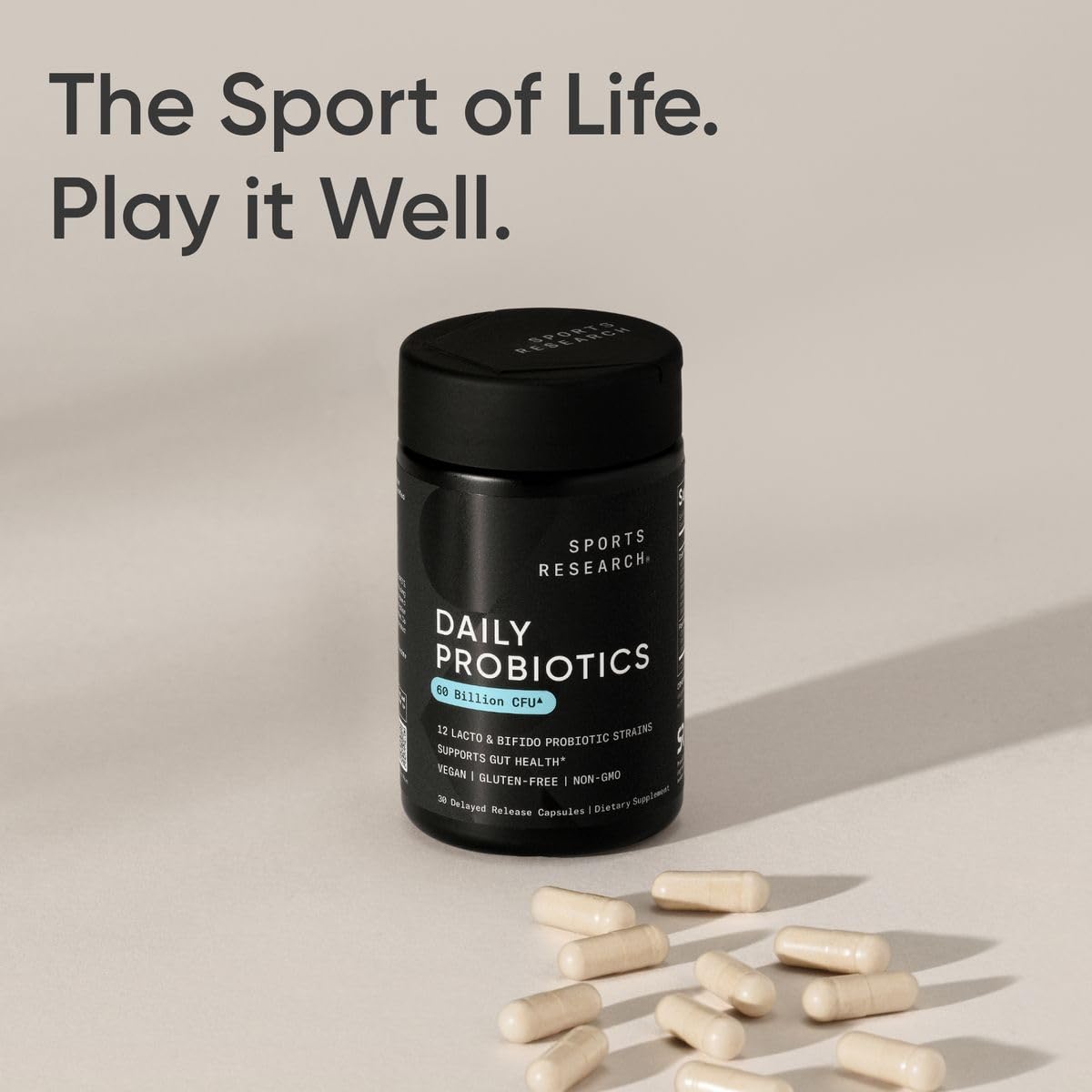 Sports Research Probiotic 60 Billion CFUs with a glass of water