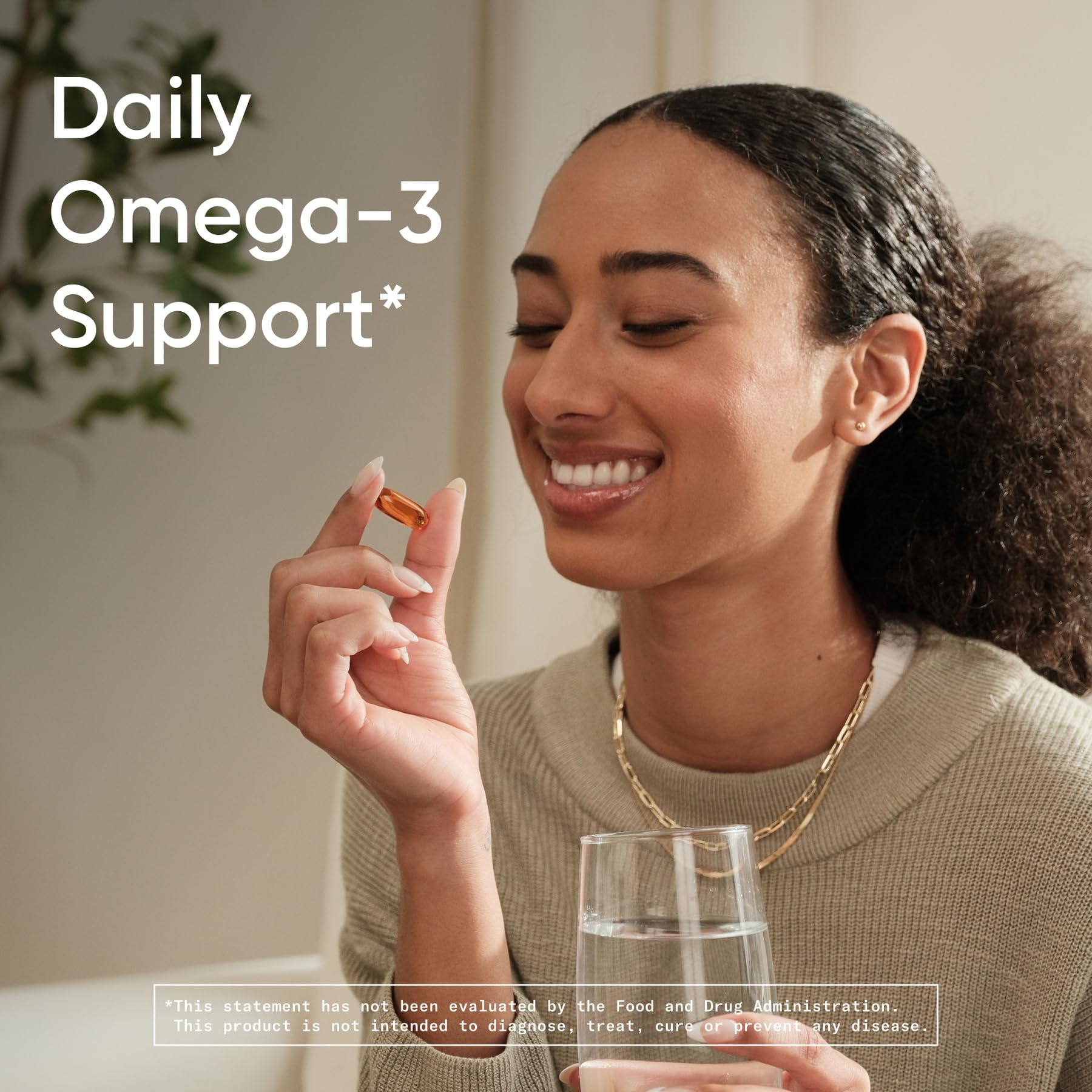 Sports Research Salmon Oil Softgels displayed with fish