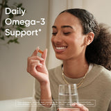 Sports Research Salmon Oil Softgels displayed with fish
