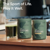 Sports Research Spirulina Greens Powder in a glass with smoothie