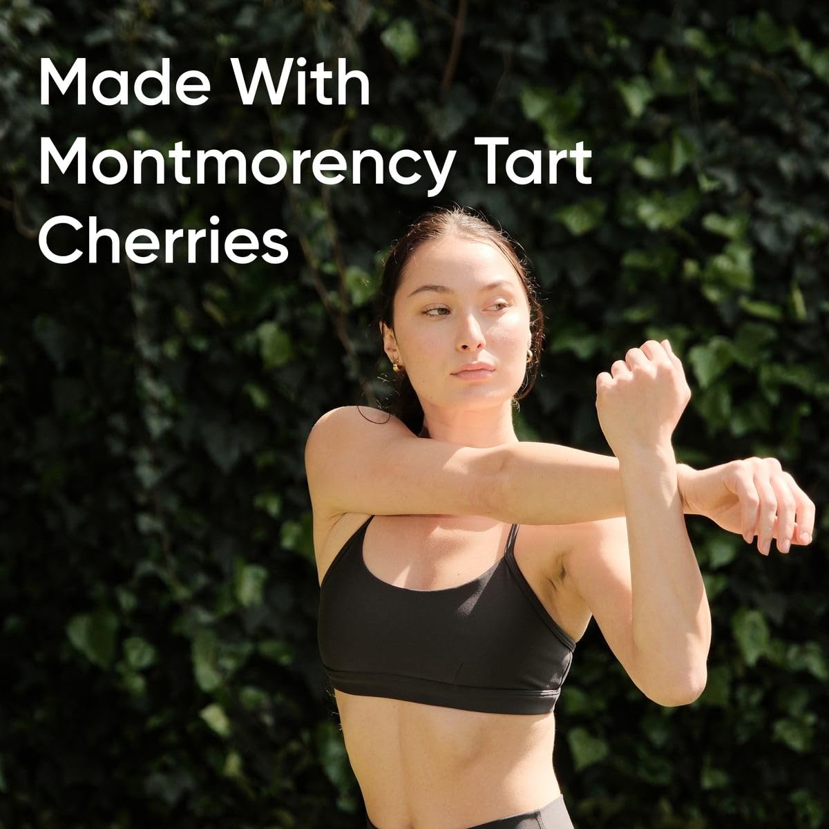 Sports Research Tart Cherry Fruit Complex Liquid Softgels on a wooden table