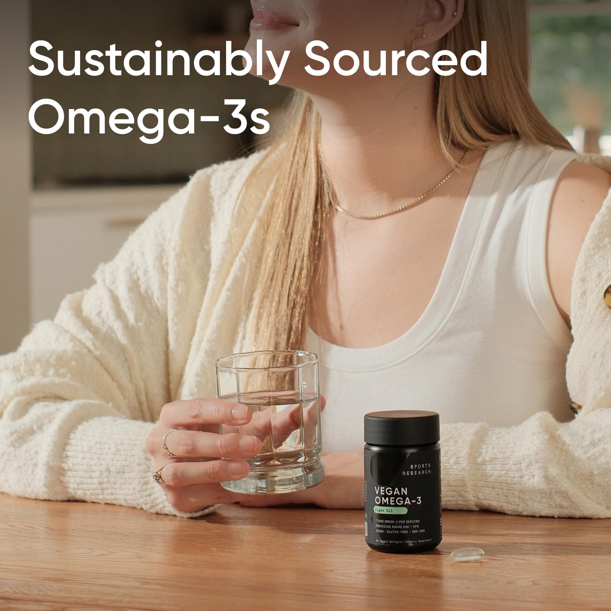Sports Research Vegan Omega-3 Algae Oil 770mg on a wooden table