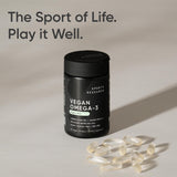 Sports Research Vegan Omega-3 Algae Oil 770mg with a measuring spoon