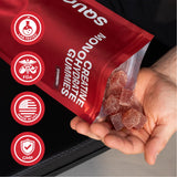 SquatGummi Creatine Gummies with a measuring scoop