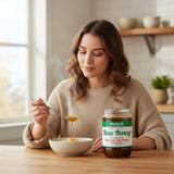 Stakich Royal Jelly Pure Raw Honey Blend 40 oz jar open with honey