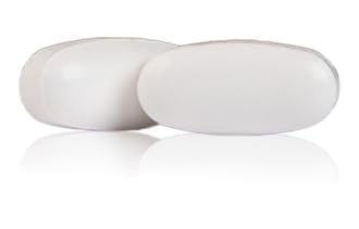 Standard Process Magnesium Lactate 100g packaging on a table