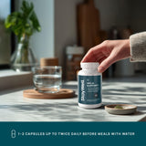 Stay-Well Naturals Curcumin Herbal Supplement on a wooden table
