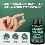 StrongVit Multimineral Capsules displayed with a glass of water
